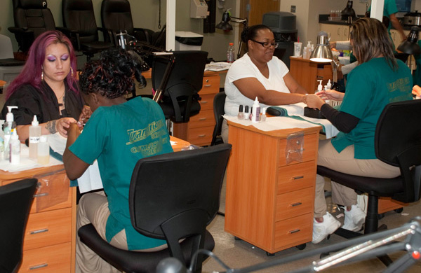Student getting manicure at Transitions School of Cosmetology